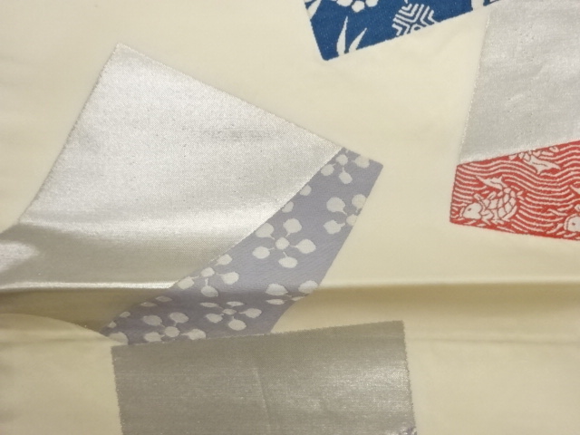  色紙に古典柄模様織出し袋帯